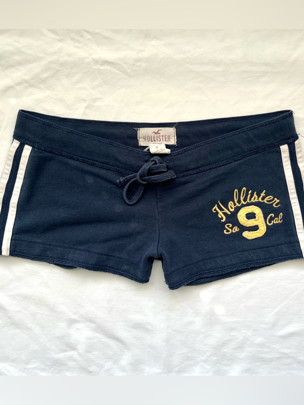 Hollister Navy Athletic Short Shorts with White Side Stripes & Yellow Embroidery